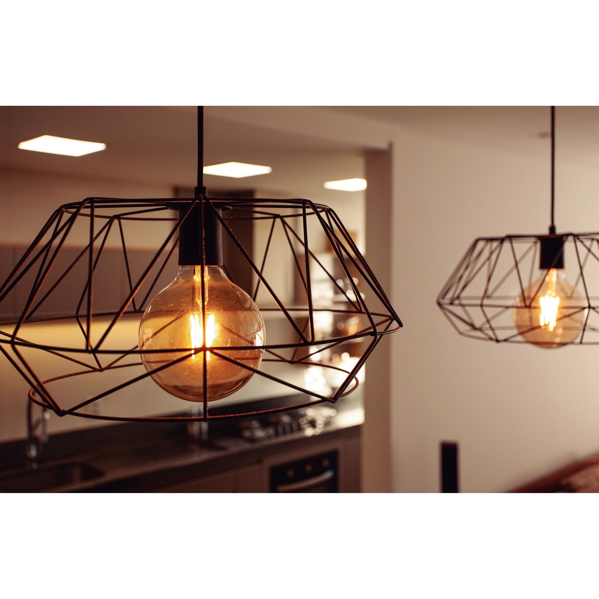 Lâmpada LED Filamento Tramontina G125 4W 2200K luz Amarela Vidro